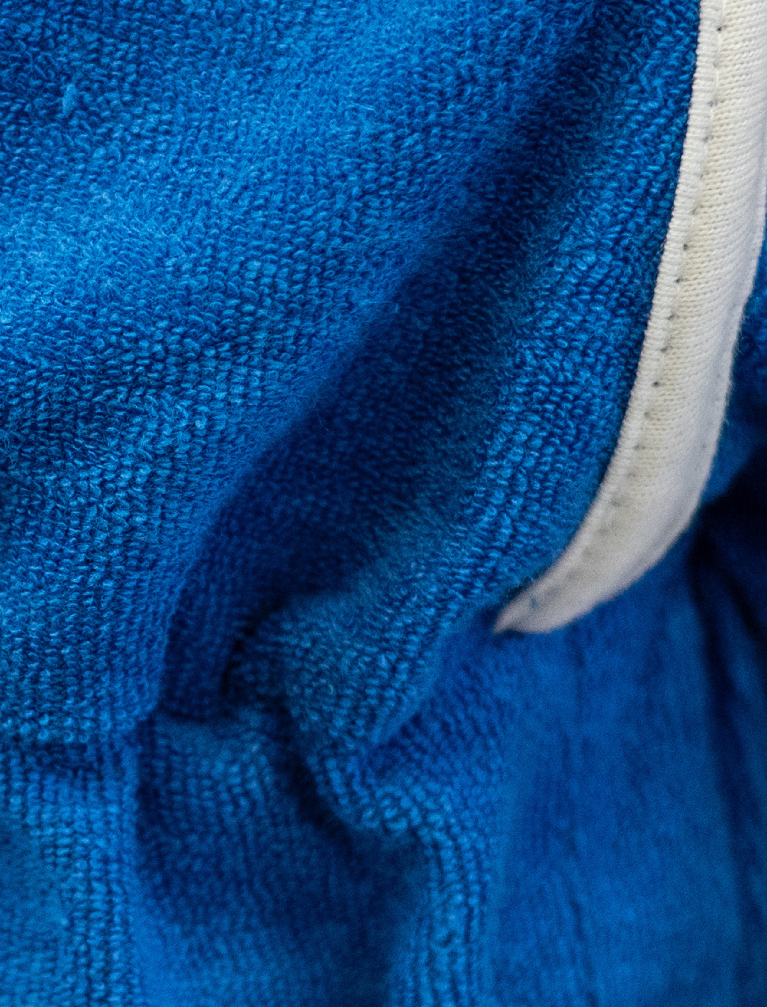 Jumper de toalla para niña azul detalle