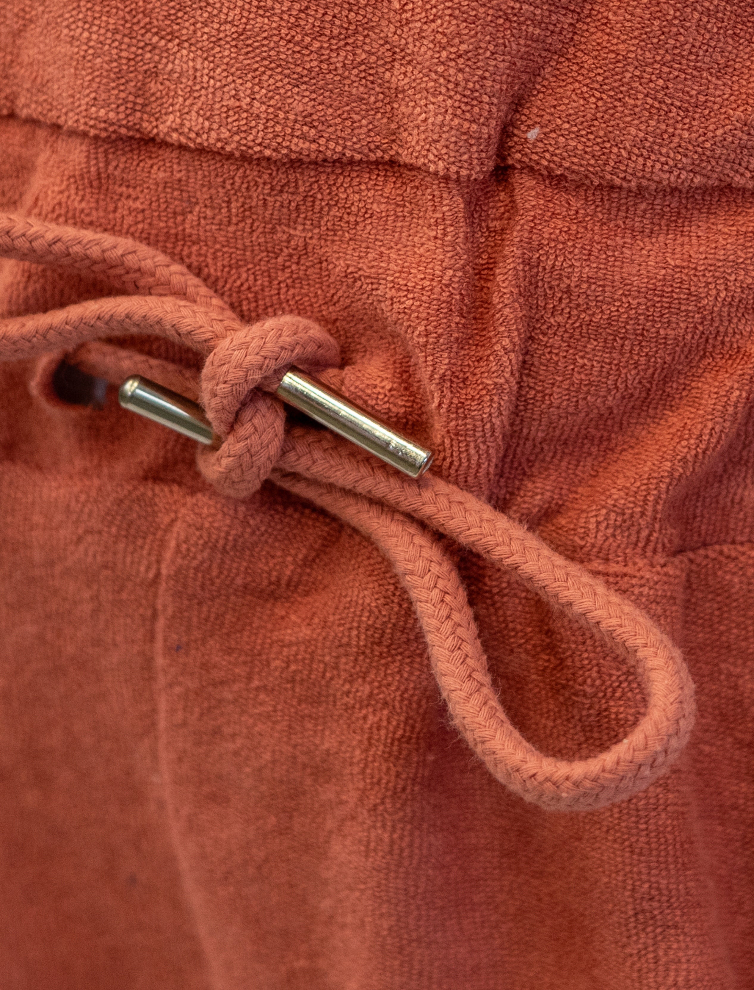 Jumper de toalla para niña coral detalle