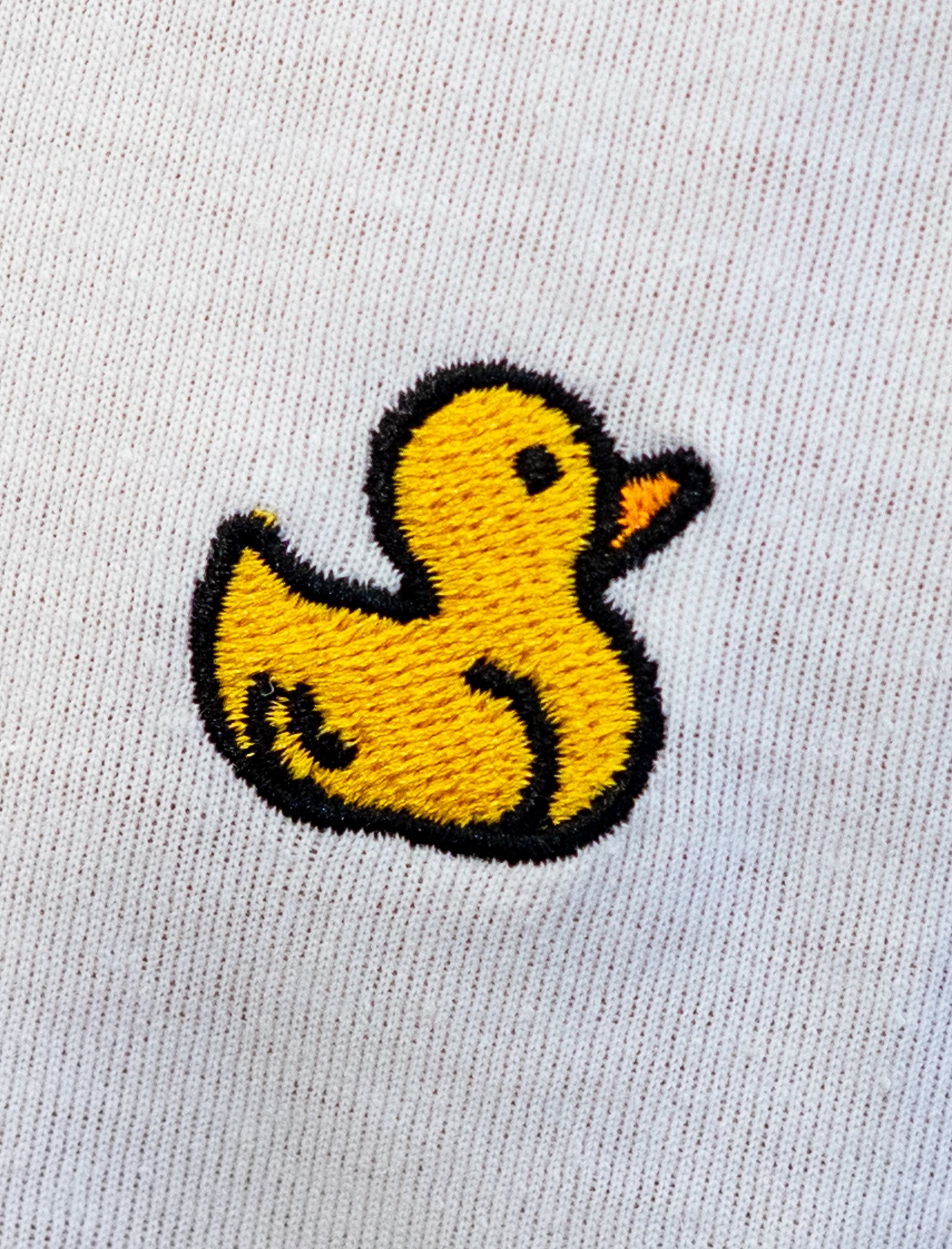 Detalle Diamond Finish Duck color blanco