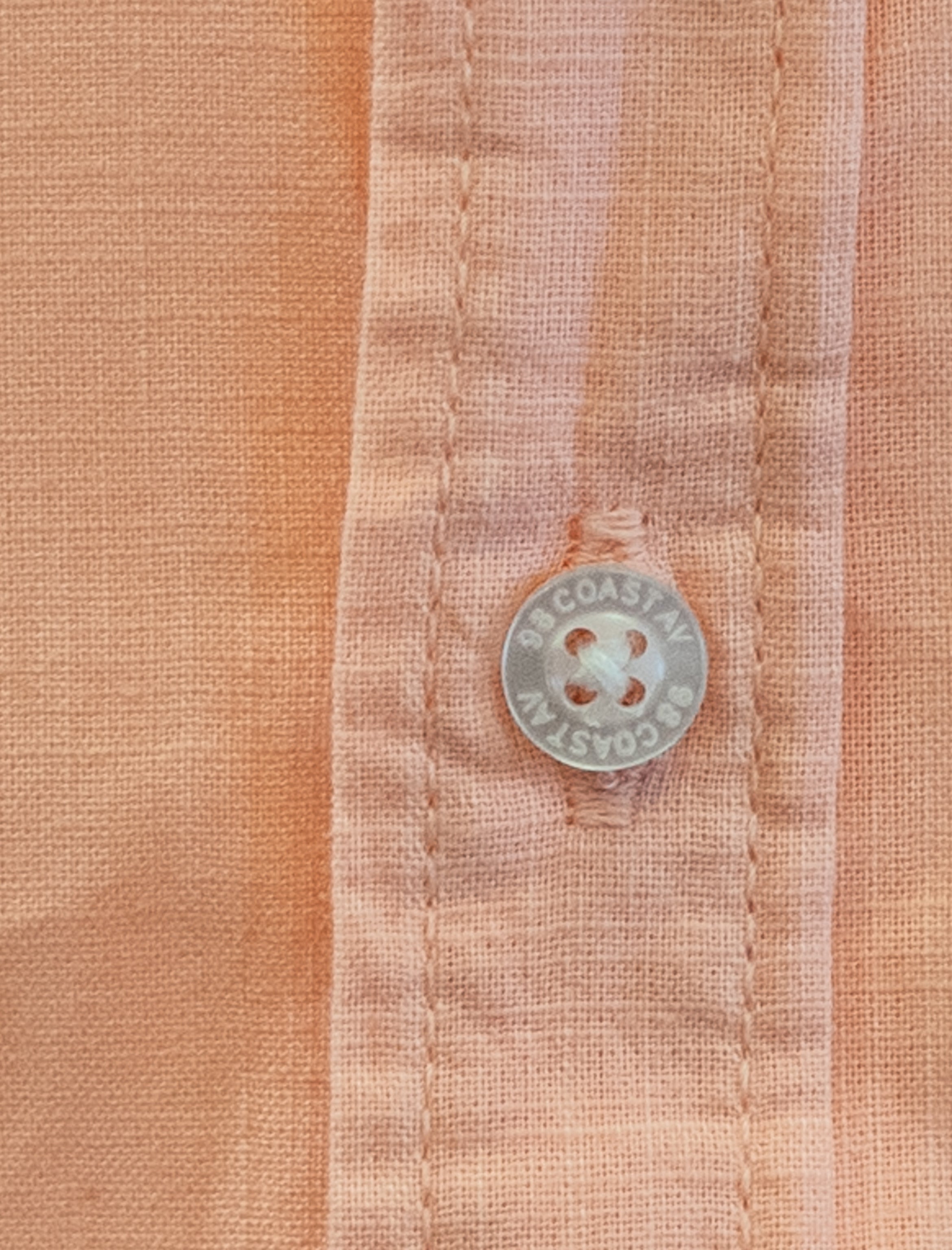 Camisa durazno para niño en algodón slub detalle