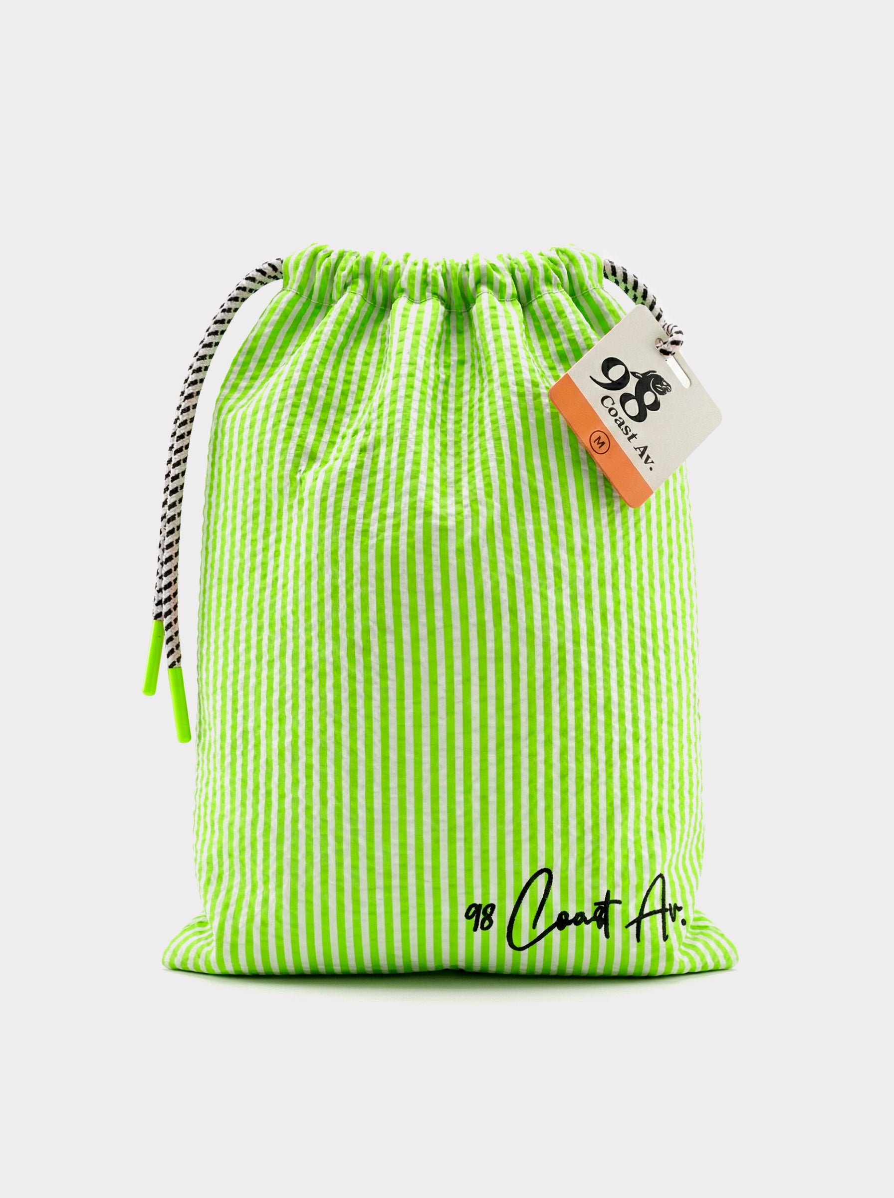 Traje de baño Waterline para niño verde, bolsa para guardar el traje de baño
